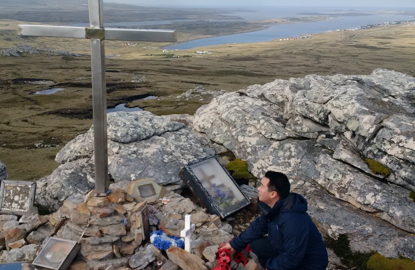 Alan Mak MP pays tribute at the hilltop memorial to British servicemen killed at the Battle of Mount Tumbledown in the Falklands.