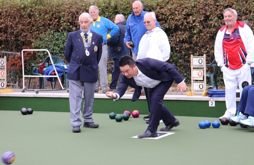 Local MP Alan Mak casts the first woods on the new all-weather surface