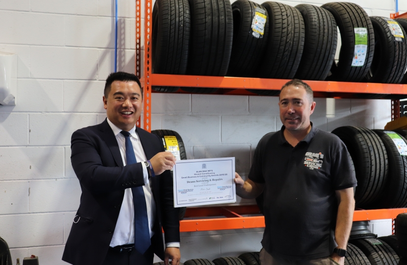 Local MP Alan Mak met Dean at the repair shop to present him with the Small Business Award
