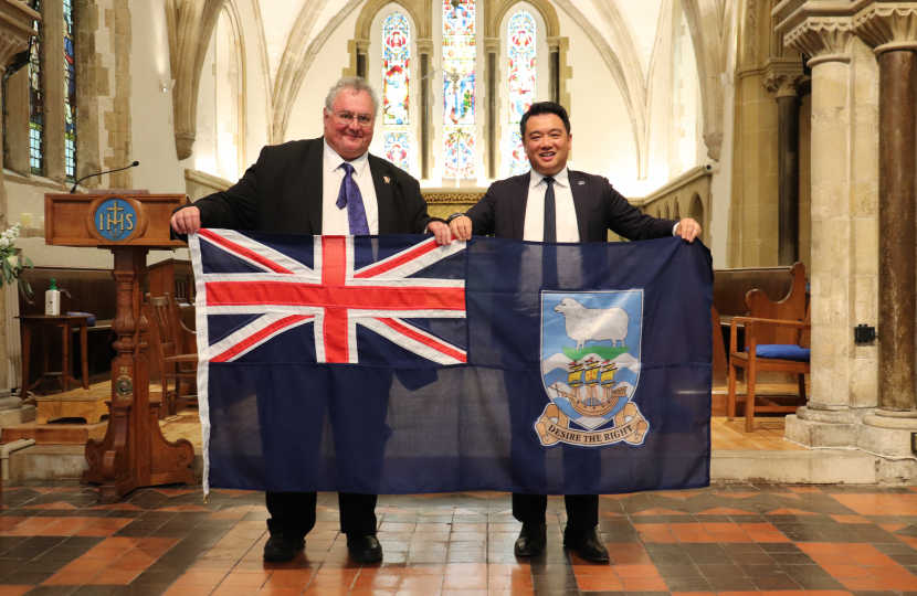 Alan Mak MP holding Falklands Island flag