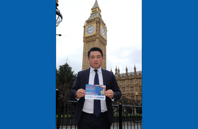 Alan Mak MP with his Cost of Living Guide after successfully campaigning in Westminster for the payments to be delivered. 