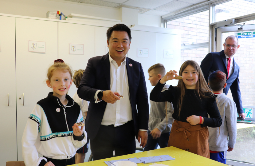 Local MP Alan Mak took part in an activity with the children to make Coronation cookies [2]