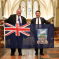 Local MP Alan Mak receives a Falklands Flag from Legislative Assembly Member for Stanley Roger Spink.