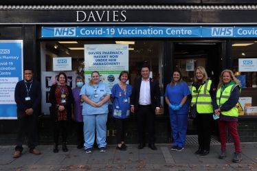 Local MP Alan Mak met co-owner Nemesh Patel and volunteers at the Davies Pharmacy rolling out the booster vaccines