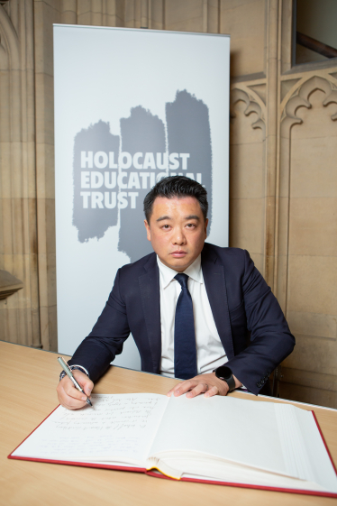 Alan Mak MP signs the Holocaust Educational Trust Book of Commitment in Parliament 